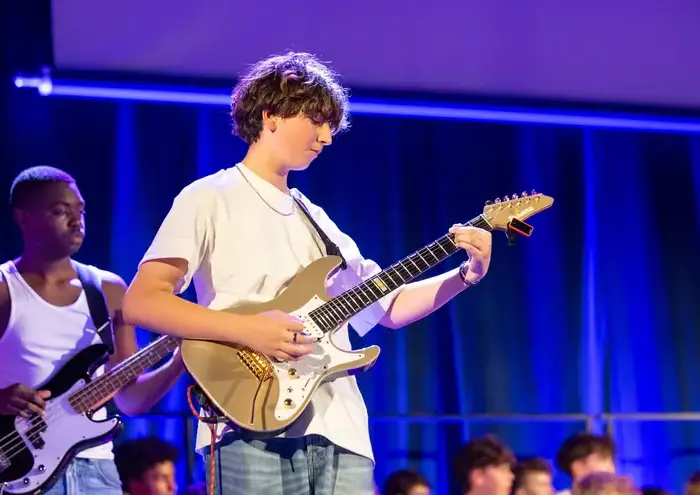 Boy playing guitar