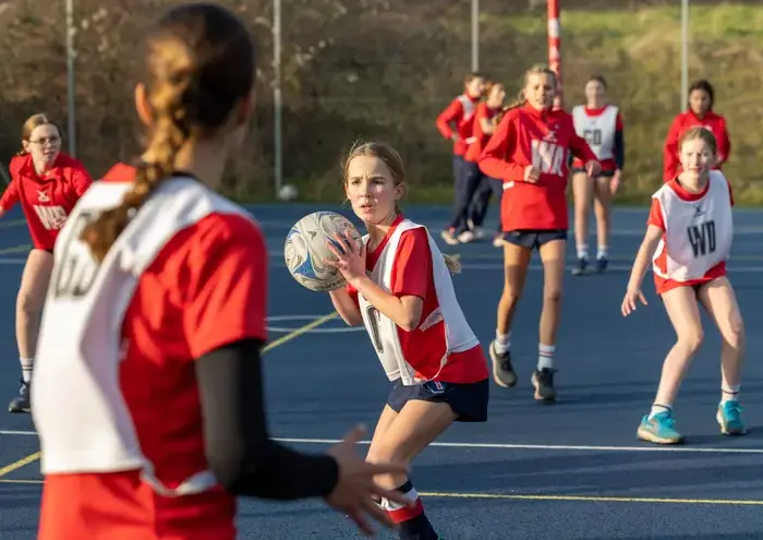 Girls playing netball