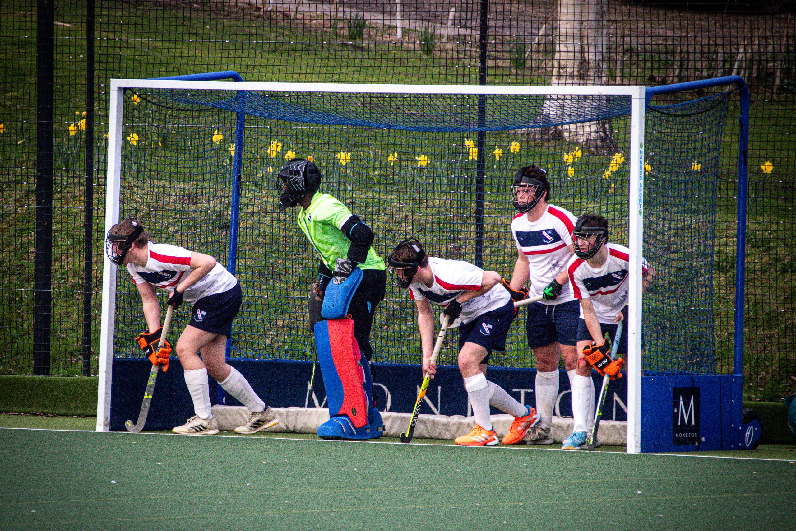 boys defending a short corner