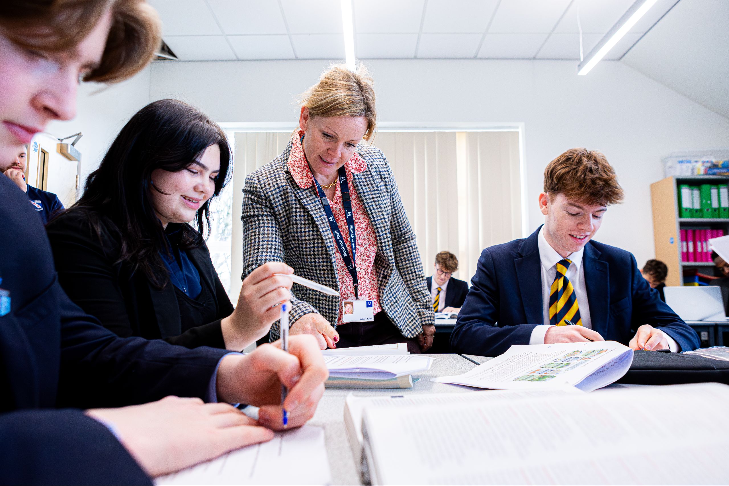 teacher and pupils in a classroom