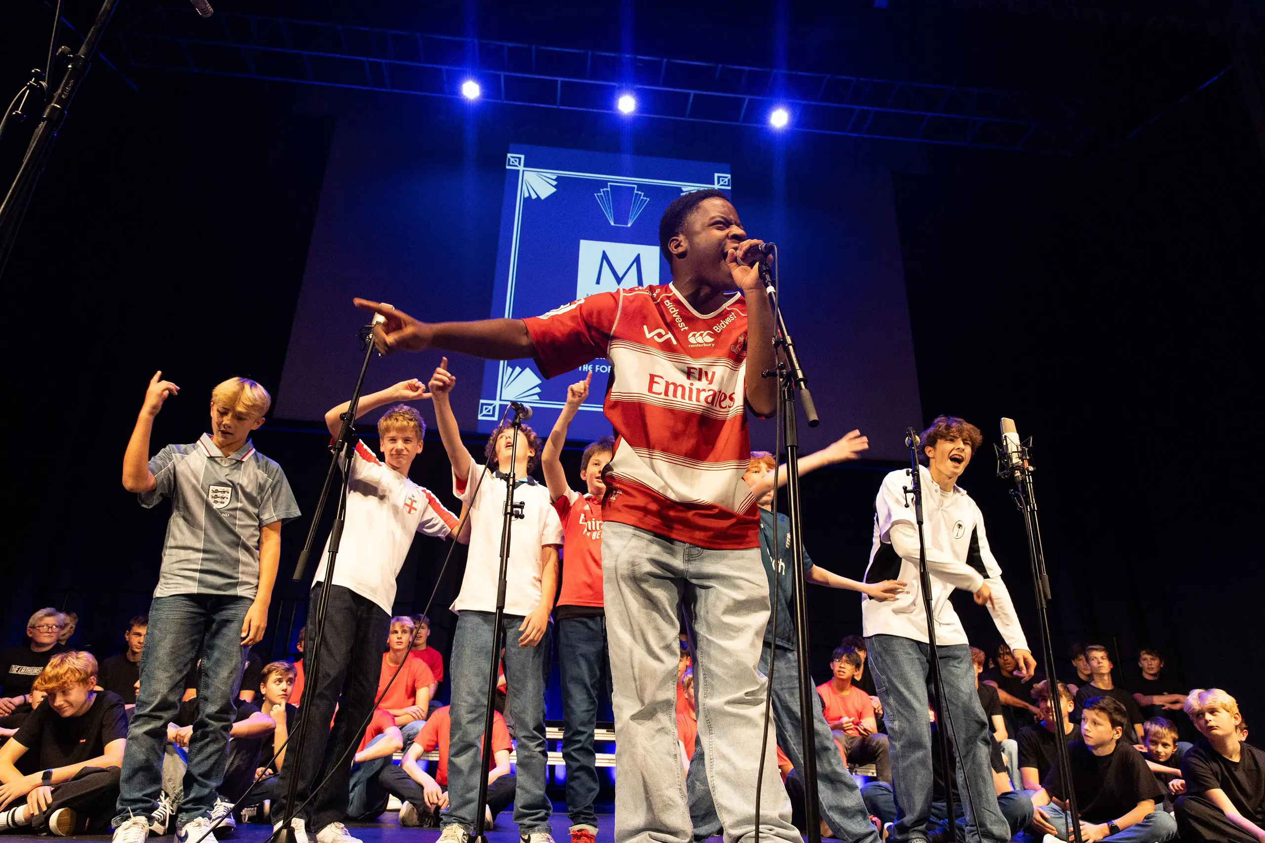 Students performing onstage