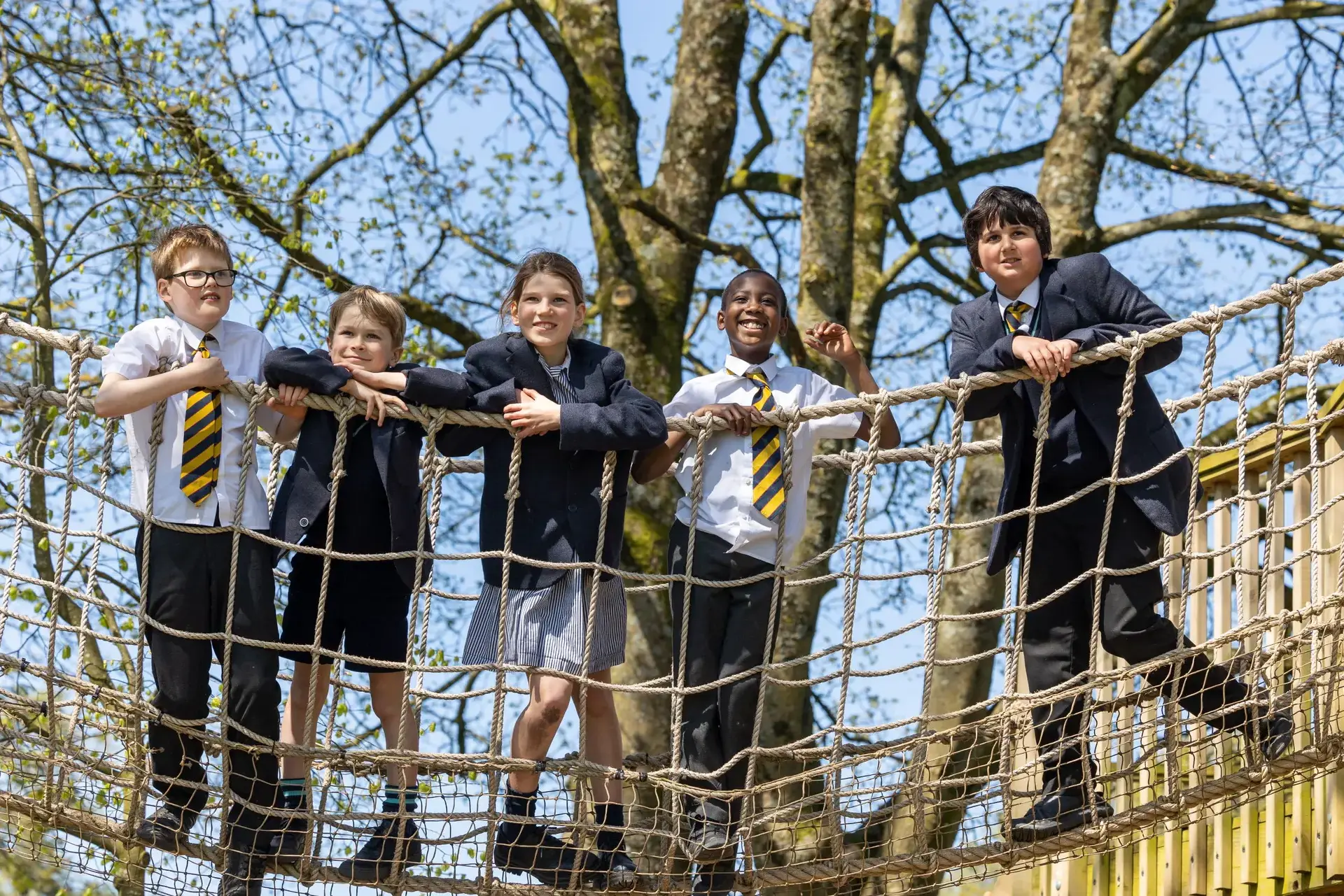 Group of children outside on Tree House bridge 
