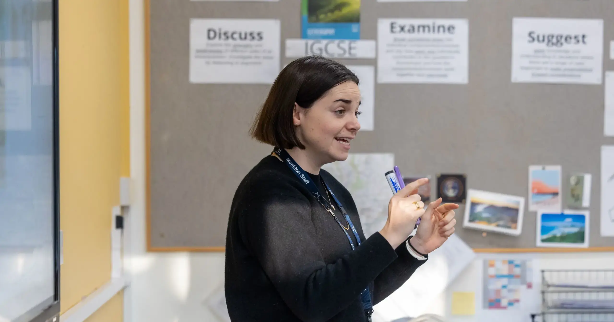 Teacher in classroom teaching