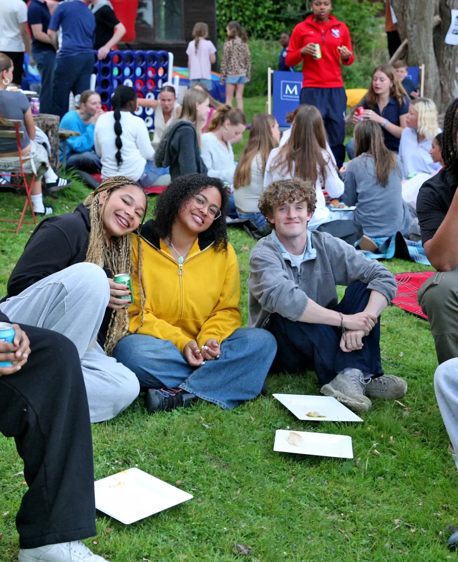 Mixed group of boarders enjoying weekend activity