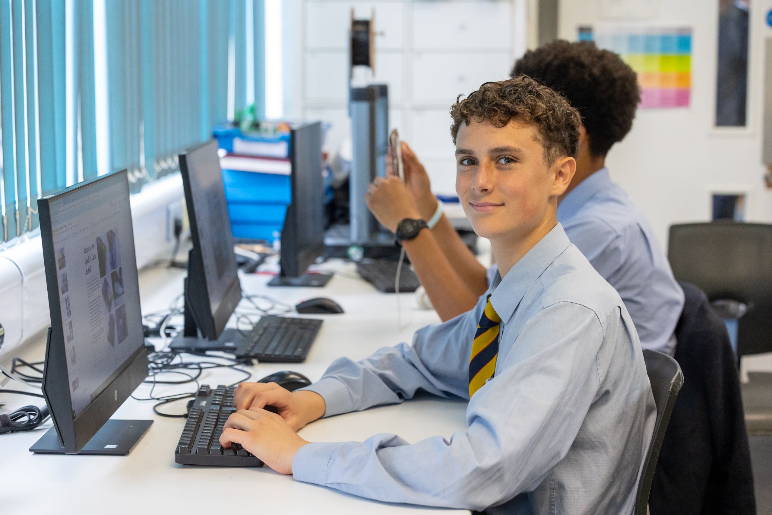 boy learning on computer