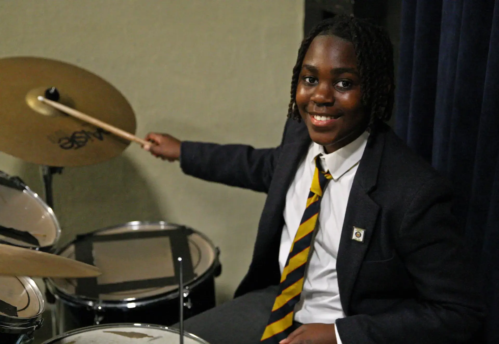 Prep student playing drums
