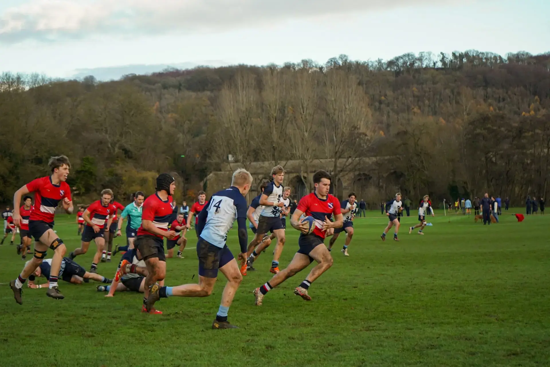 Boys playing rugby