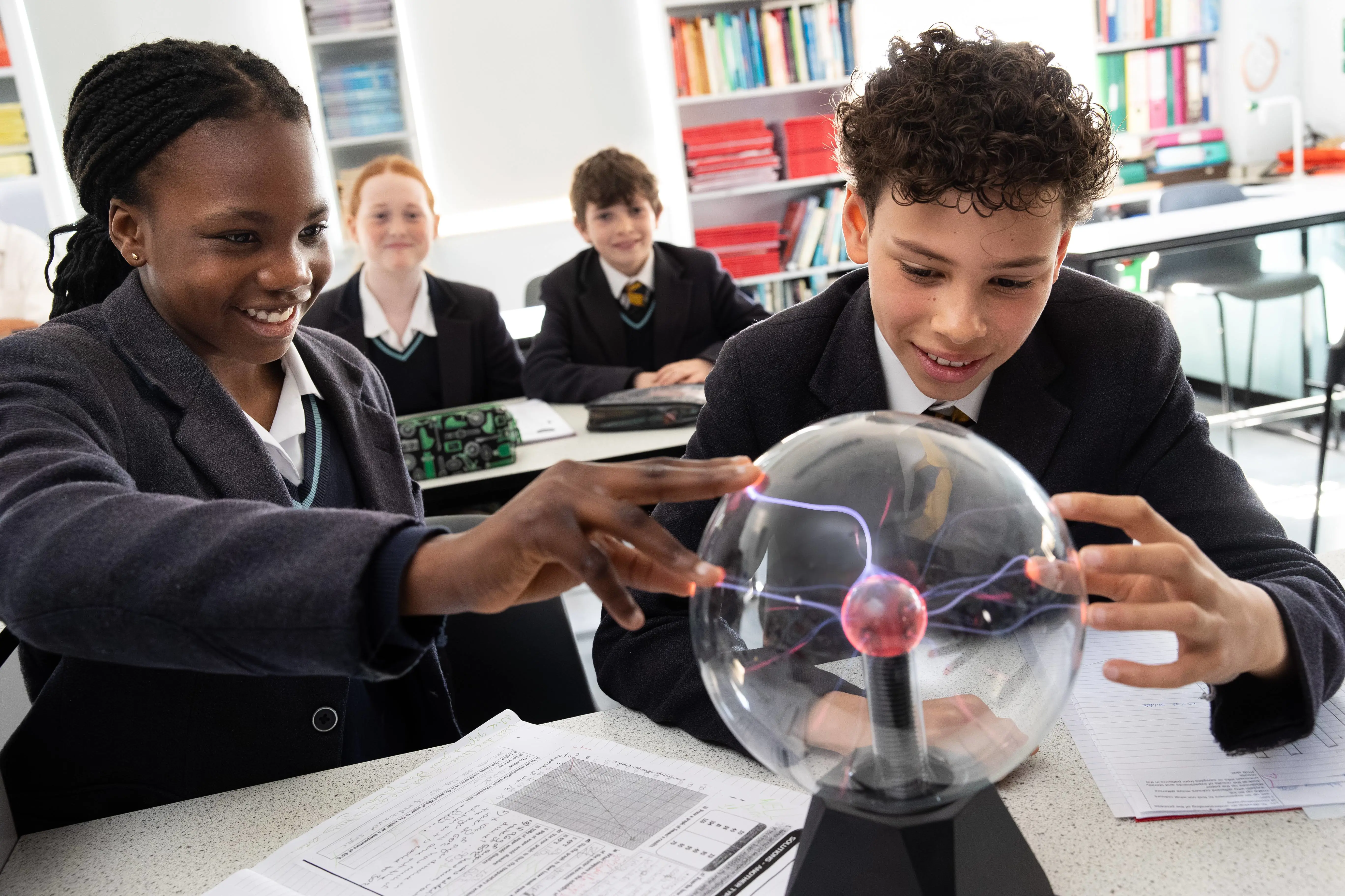 girl and boy with science sparks