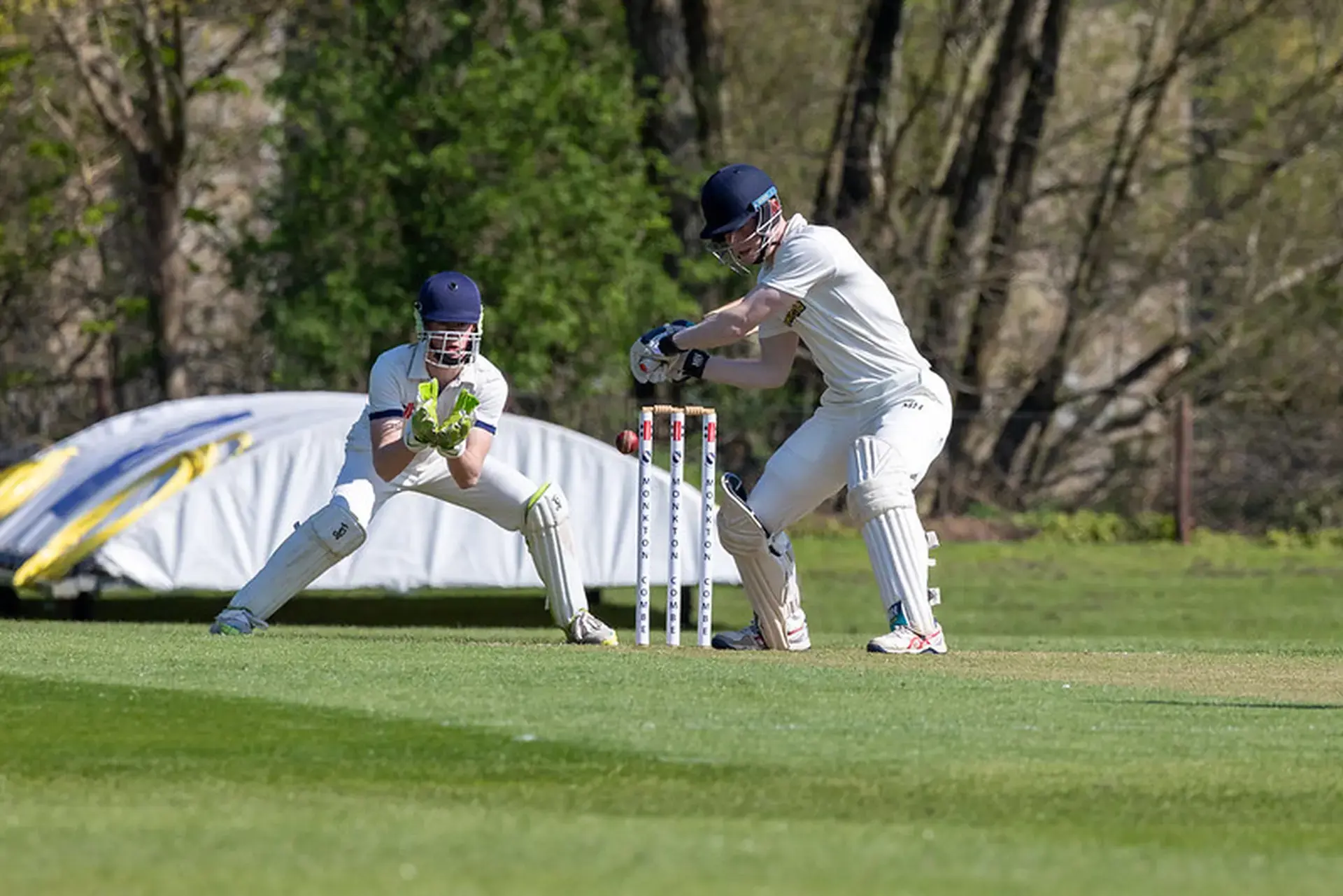 Students playing in a cricket match