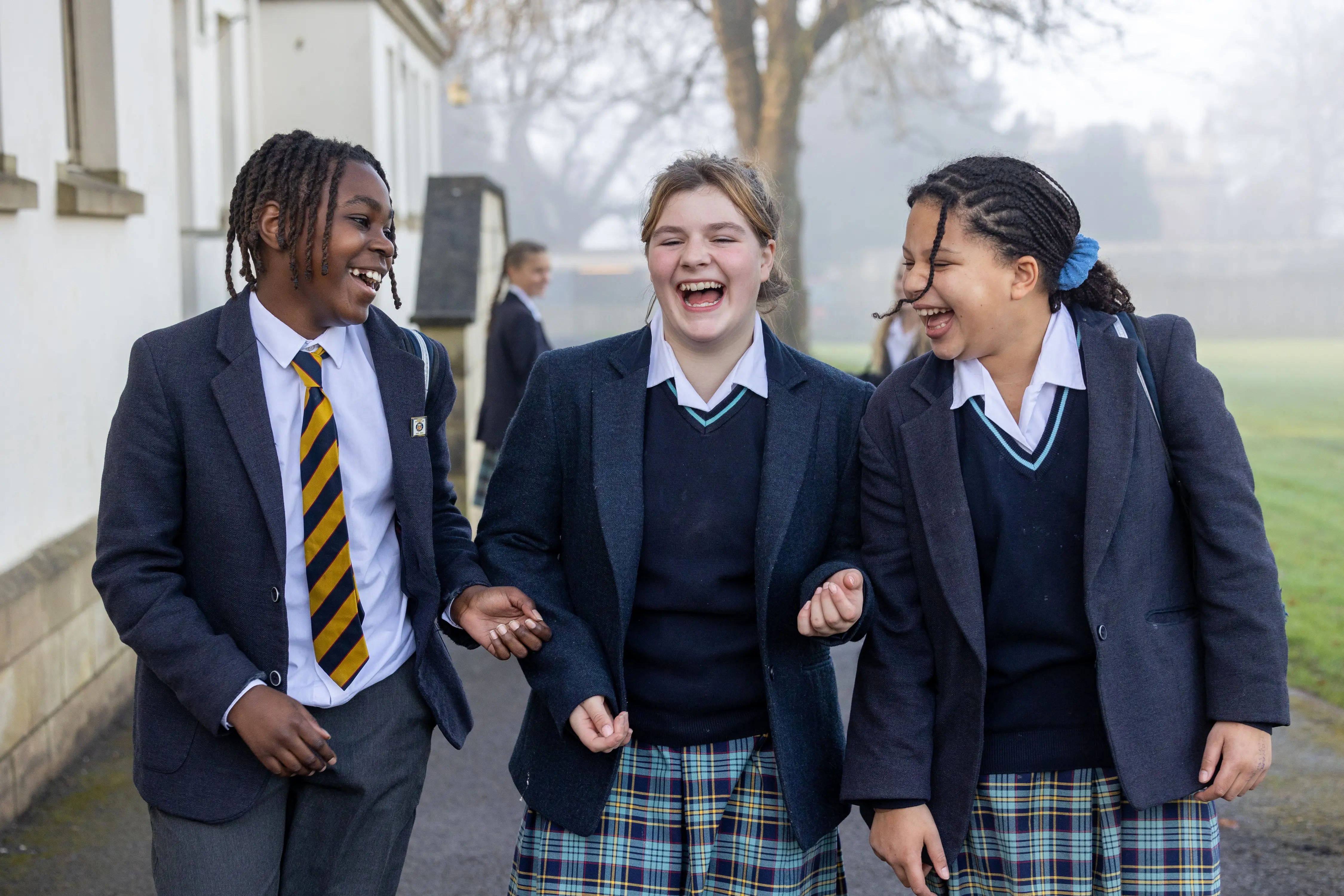 students laughing between classes